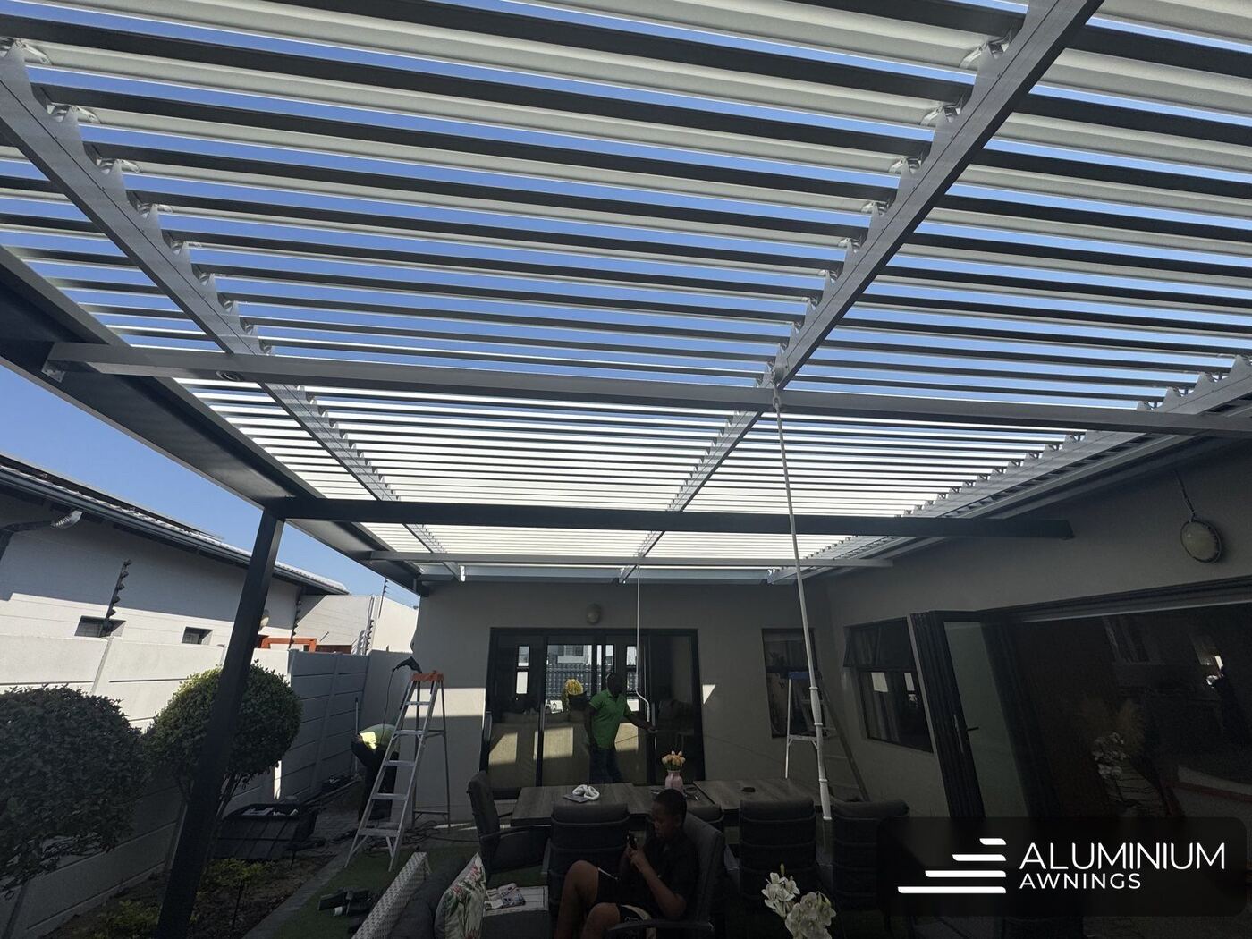 Charcoal frame white louvre roof blouberg