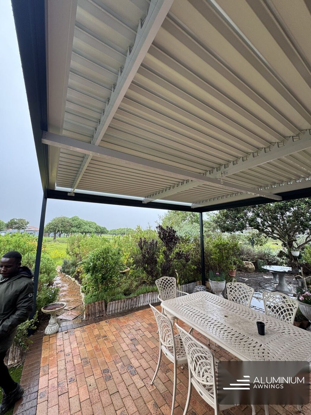 Charcoal white louvre roof west coast