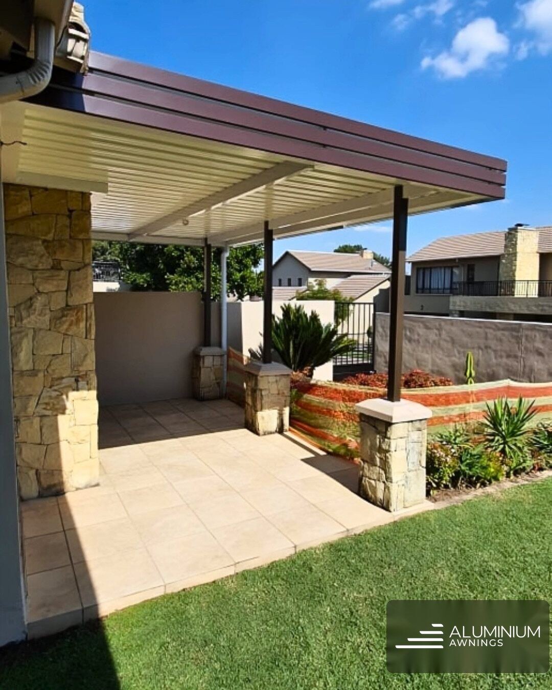 Fixed IBR awning in bronze frame with white IBR sheeting — Durbanville, Cape Town Northern Suburbs