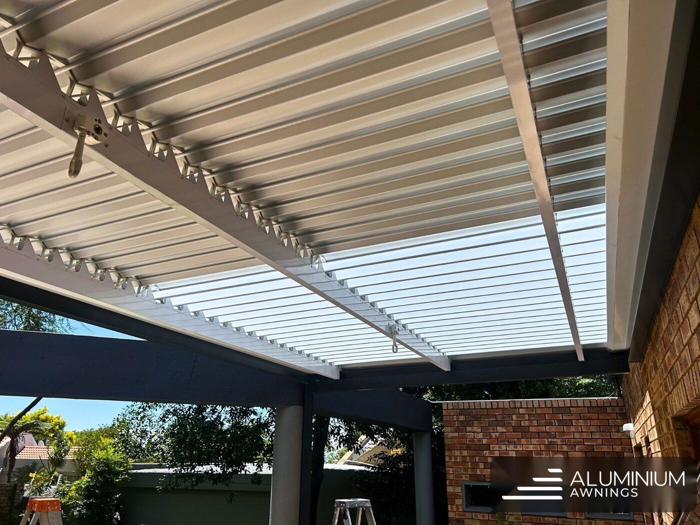 Full white manual louvre roof — Constantia, Cape Town Southern Suburbs
